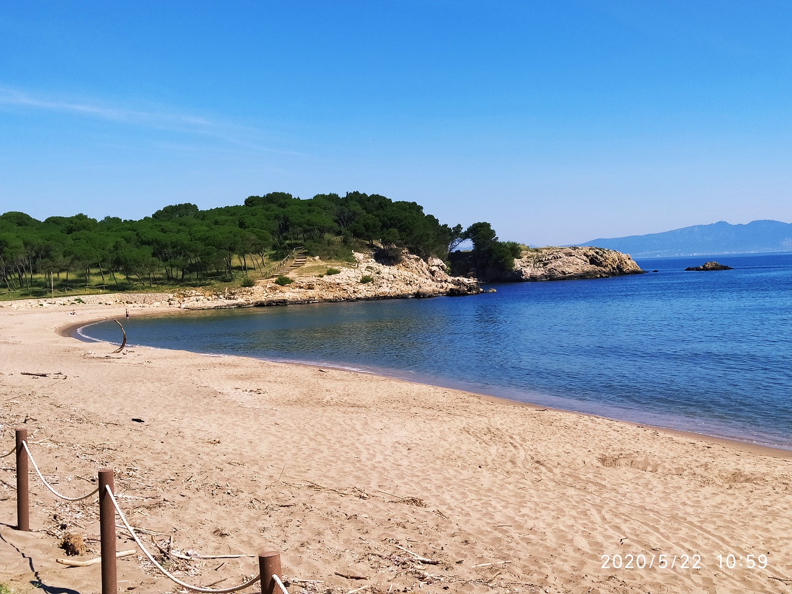 Foto di Platja El Rec del Moli con una superficie del sabbia fine marrone