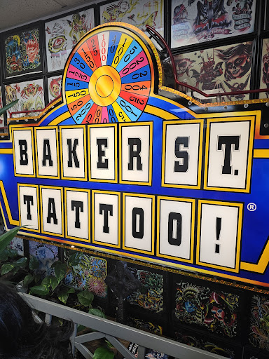 Explore men back tattoo idea, creative tattoo ideas in Media, available at Baker Street Tattoo