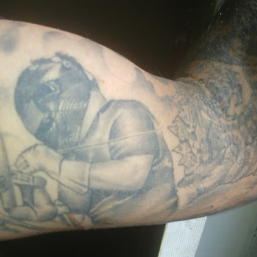 Explore dog paw tattoo ideas, creative tattoo ideas in Fullerton, available at In The Skin Tattoos