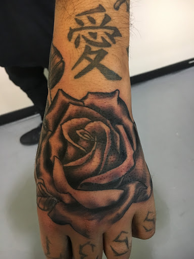 Explore no regrets tattoo ideas, creative tattoo ideas in Houston, available at Rose & Dagger Tattoo