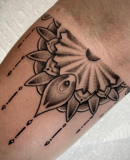 Explore tattoo ideas for crosses, creative tattoo ideas in Charlotte, available at Canvas Tattoo & Art Gallery