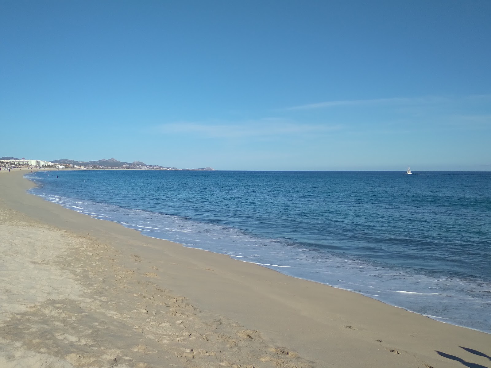 Fotografija Costa Azul Beach II z svetel fin pesek površino