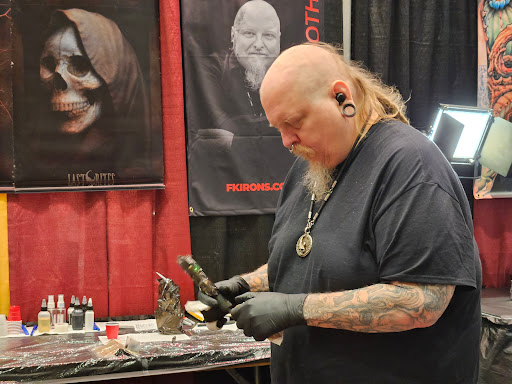 Explore tattoo ideas for leg sleeve, creative tattoo ideas in Angola, available at Hoodlum Ink