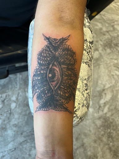 Explore long skinny tattoo ideas, creative tattoo ideas in Seymour, available at American Gypsy Tattoo Corp.