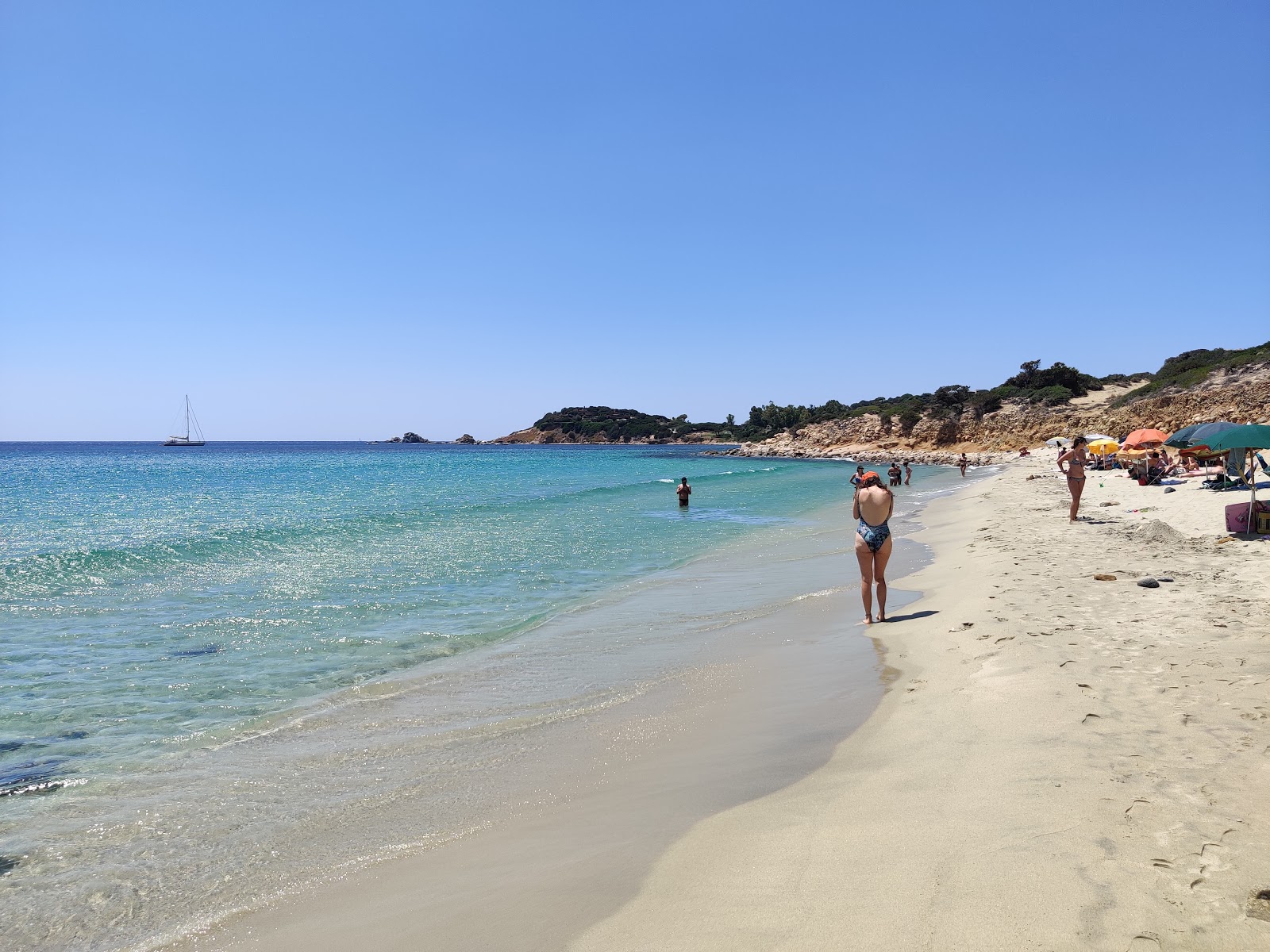 Fotografija Spiaggia Is Piscadeddus divje območje