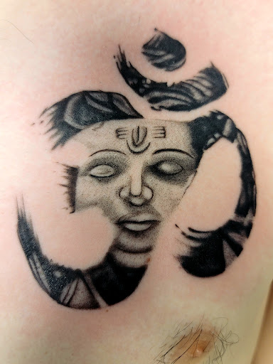 Explore feminine cover up tattoo ideas, creative tattoo ideas in Lexington, available at Fallen Angel Tattoo Studio llc