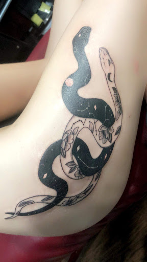 Explore watercolor flower tattoo ideas, creative tattoo ideas in Cape Coral, available at UNRIVALED INK