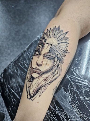 Explore cover up tattoo ideas for females, creative tattoo ideas in Fredericksburg, available at Tattoo Haven