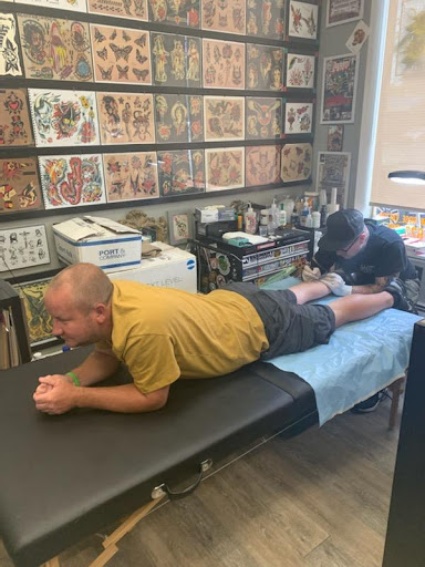 Explore superman tattoo ideas, creative tattoo ideas in Glenside, available at Yellow Rose Tattoo
