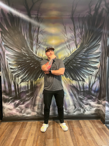 Explore black and red tattoo ideas, creative tattoo ideas in Clarksville, available at Dark Raine Tattoo