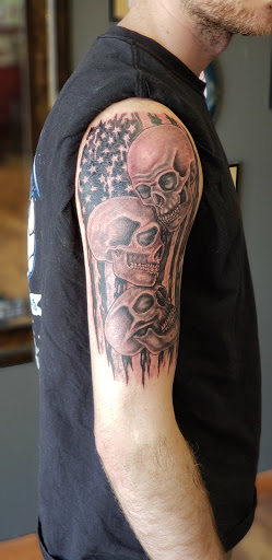 Explore state tattoo ideas, creative tattoo ideas in Avon, available at Altered Image Tattoo and Piercing Studio