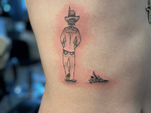 Explore garter tattoo ideas, creative tattoo ideas in Bloomington, available at Crimson Breed Tattoo Studio