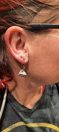 Explore space filler tattoo ideas, creative tattoo ideas in Eugene, available at Area 51 Piercing