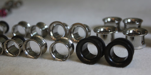 Explore small flowers tattoo ideas, creative tattoo ideas in New Brunswick, available at Sanctum Body Art