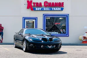 XTRA CHANGE OF MAHOPAC, INC. (BUY•SELL•TRADE) image