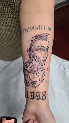 Explore king tattoo ideas, creative tattoo ideas in Colorado Springs, available at Fallen Heroes Tattoo & Piercing (Colorado)