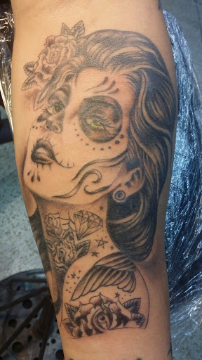 Explore january birth flower tattoo ideas, creative tattoo ideas in Wilmington, available at Hardwire Tattoo & Body Piercing