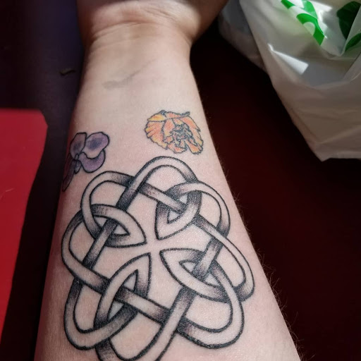 Explore wisconsin tattoo ideas, creative tattoo ideas in Lewiston, available at Altered Image Tattoo Studio