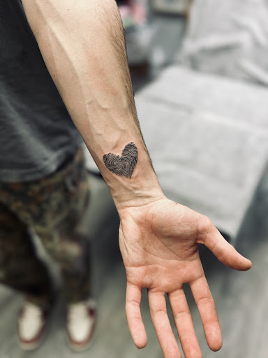 Explore black and white tattoo ideas for men, creative tattoo ideas in Holmen, available at Driftless Tattoo and Art LLC