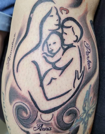 Explore ideas for roman numeral tattoos, creative tattoo ideas in Angola, available at Hoodlum Ink