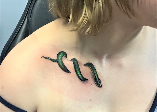 Explore women shoulder tattoo ideas, creative tattoo ideas in Whitehall, available at Beachside Tattoos & Smoke Shop