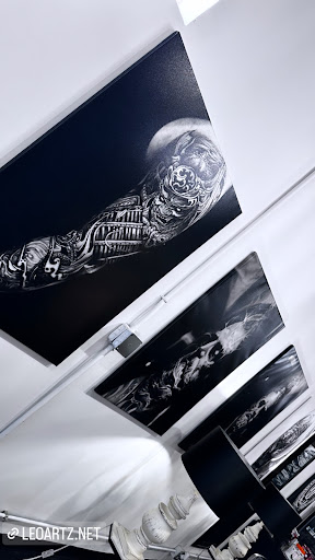 Explore tattoo ideas thigh, creative tattoo ideas in Saint Paul, available at Supreme Art Of War Inc