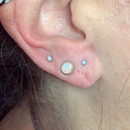 Find tummy tuck tattoo ideas for your next unique tattoo in Fort Walton Beach at Piercings by Torrie