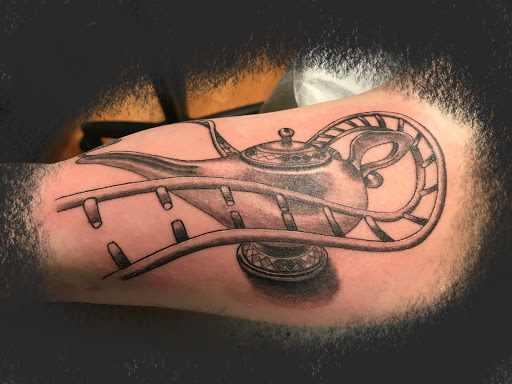 Explore heart attack tattoo ideas, creative tattoo ideas in Clarksville, available at Chris Wallace Tattoos