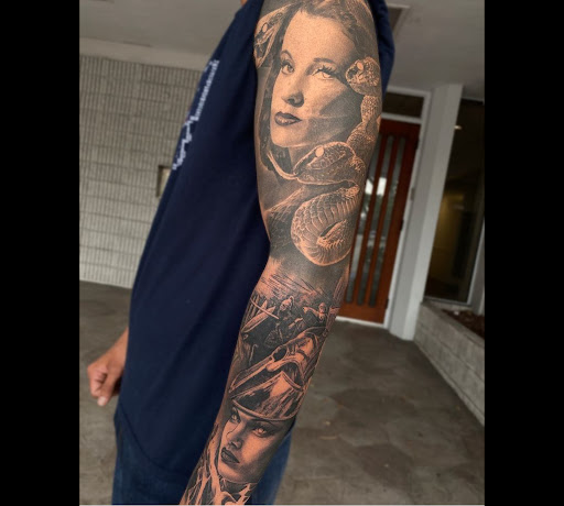 Explore hawaiian tattoo ideas for men, creative tattoo ideas in Hollywood, available at Sacred Eye Tattoos