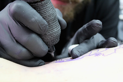 Explore 3 percenter tattoo ideas, creative tattoo ideas in North Fort Myers, available at Loyal 2 The Coil Tattoos & Body Piercings