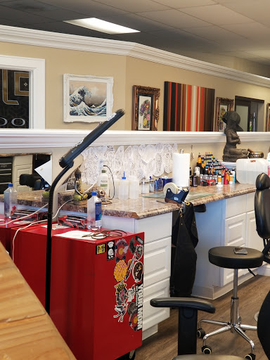 Tattoo Shop «White Lotus Custom Tattoo & Professional Piercing», reviews and photos, 7500 S University Blvd #110, Centennial, CO 80122, USA