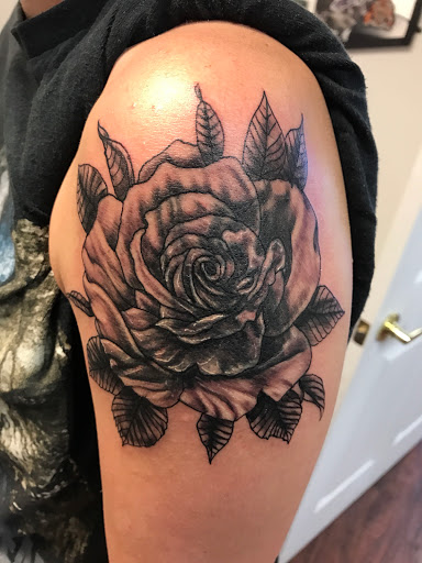 Explore meaningful early miscarriage tattoo ideas, creative tattoo ideas in Seymour, available at American Gypsy Tattoo Corp.