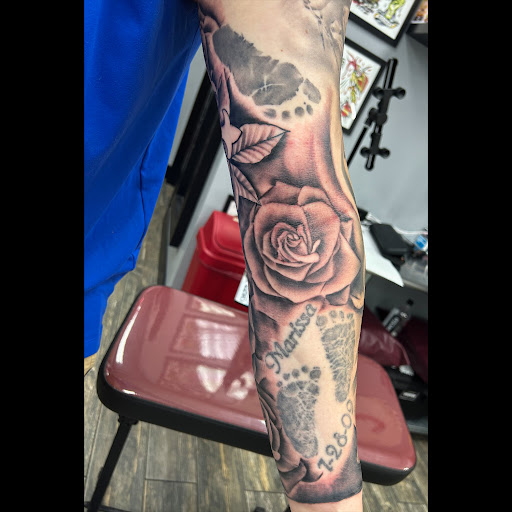 Explore grease tattoo ideas, creative tattoo ideas in El Paso, available at American Tattoo Society of Ft Bliss