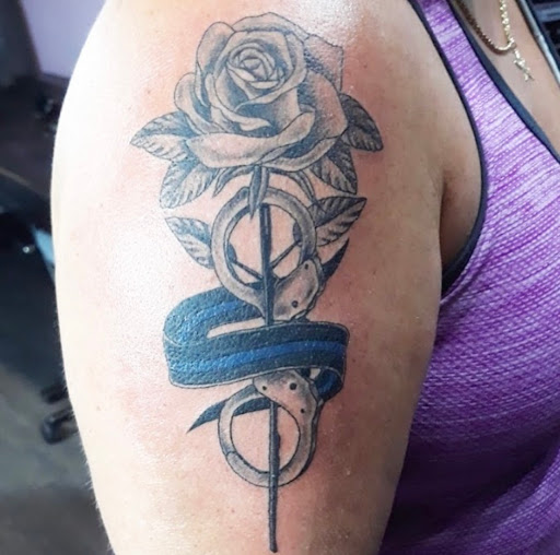 Explore beach tattoo ideas for guys, creative tattoo ideas in Fort Pierce, available at Xotic Empire Tattoos