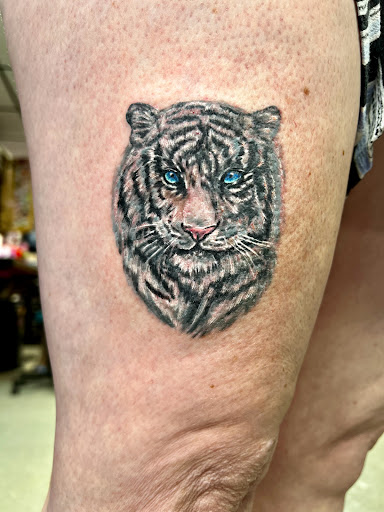 Explore tattoo ideas on rib cage, creative tattoo ideas in Goshen, available at Lady Luck Studio