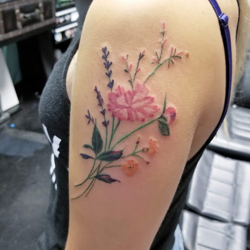 Explore santa tattoo ideas, creative tattoo ideas in Kenosha, available at Kenosha Tattoo Company