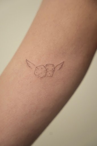 Explore book tattoo ideas small, creative tattoo ideas in New York, available at UPLIFT TATTOO & PIERCING NYC