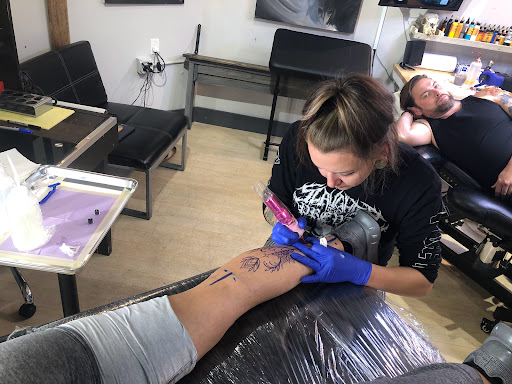 Explore flower tattoo sleeve ideas, creative tattoo ideas in Fort Wayne, available at Grade A Tattoos and Body Piercing