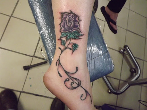 Explore tattoo ideas for dads with daughters, creative tattoo ideas in Princeton, available at Custom Dreams Tattooing and Body Piercing