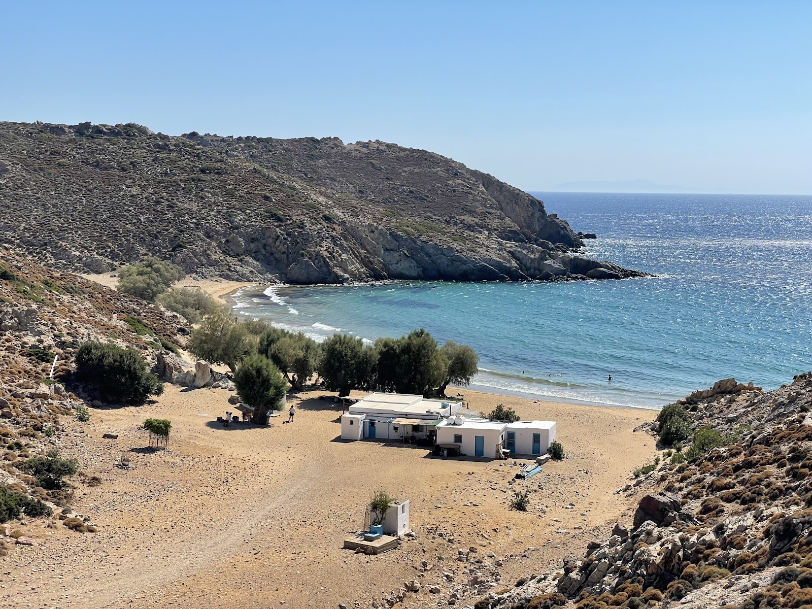 Foto di Psili Amos Beach con una superficie del sabbia beige