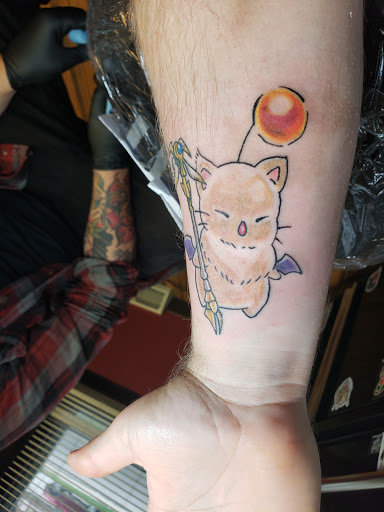 Tattoo Shop «Skinny Buddha Tattoo», reviews and photos, 203 S Monroe Ave, Green Bay, WI 54301, USA