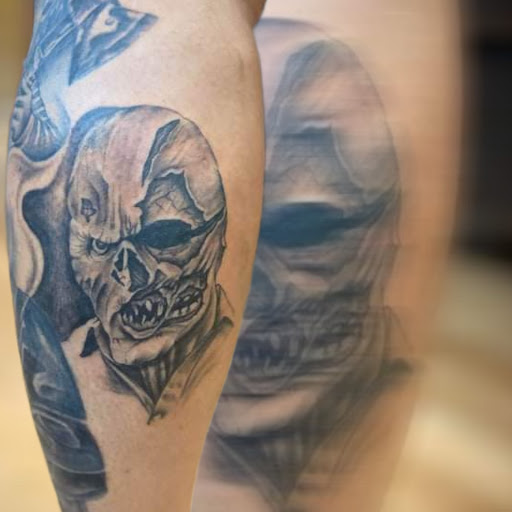 Explore cross wrist tattoo ideas, creative tattoo ideas in Milwaukee, available at West Allis Tattoo & Gallery Tattoo Shop Milwaukee