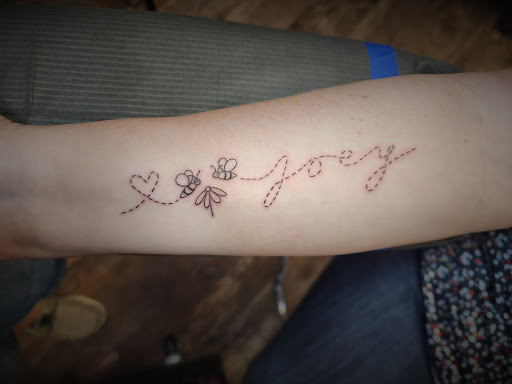 Explore tattoo ideas paw print, creative tattoo ideas in Muscatine, available at The Sapphire Lounge