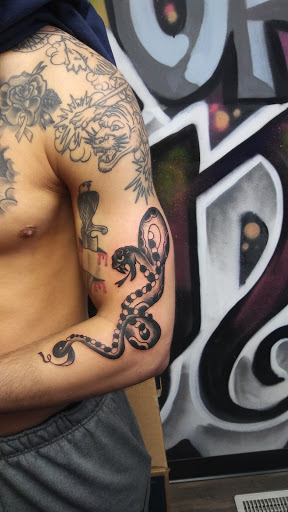 Explore good forearm tattoo ideas, creative tattoo ideas in Lansing, available at Luckys Tattoos