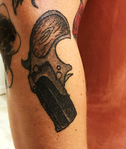 Explore dominican flag tattoo ideas, creative tattoo ideas in Owensboro, available at BnB Tattoos & Piercings