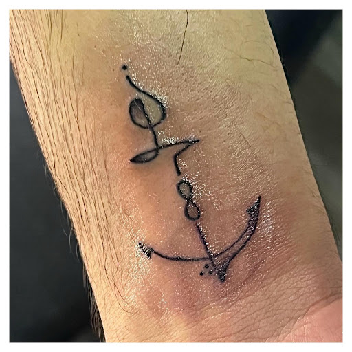 Explore fire and air tattoo ideas, creative tattoo ideas in Vermillion, available at IKTOMI-INK Tattoo Experience