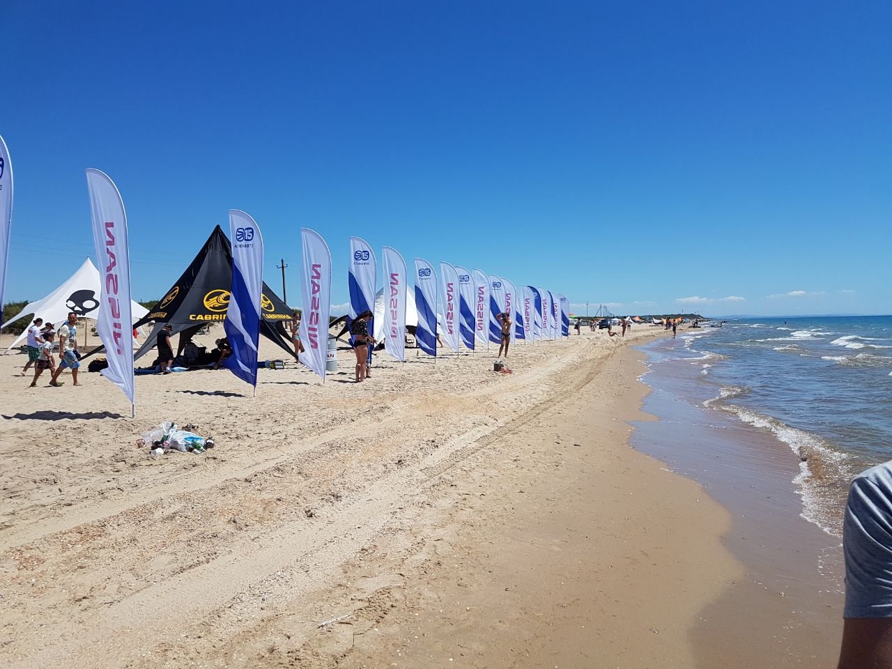 Bugazskaya kosa'in fotoğrafı turkuaz su yüzey ile