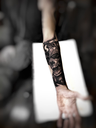 Explore head tattoo ideas for men, creative tattoo ideas in Lavonia, available at 1890 Tattoo Co.