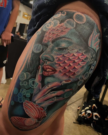 Explore music tattoo ideas for females, creative tattoo ideas in Lake Villa, available at Eternal Tiger Tattoo