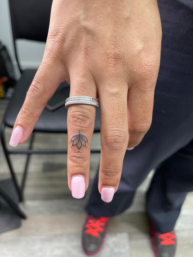 Explore finger word tattoos ideas, creative tattoo ideas in Miami, available at Glitterpoop Studios